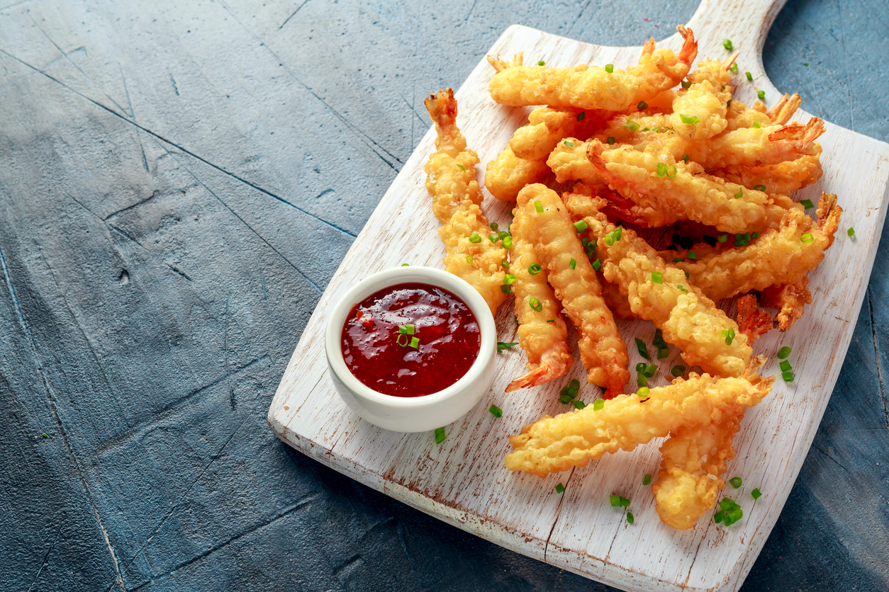 crispy shrimp tempura served with a sweet chili sauce