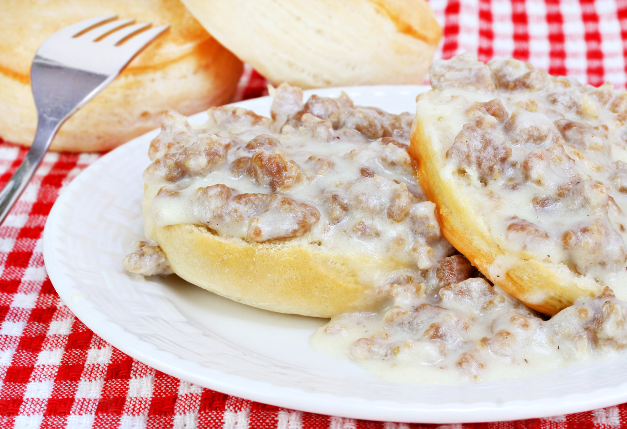 a plate of biscuits and gravy from scratch